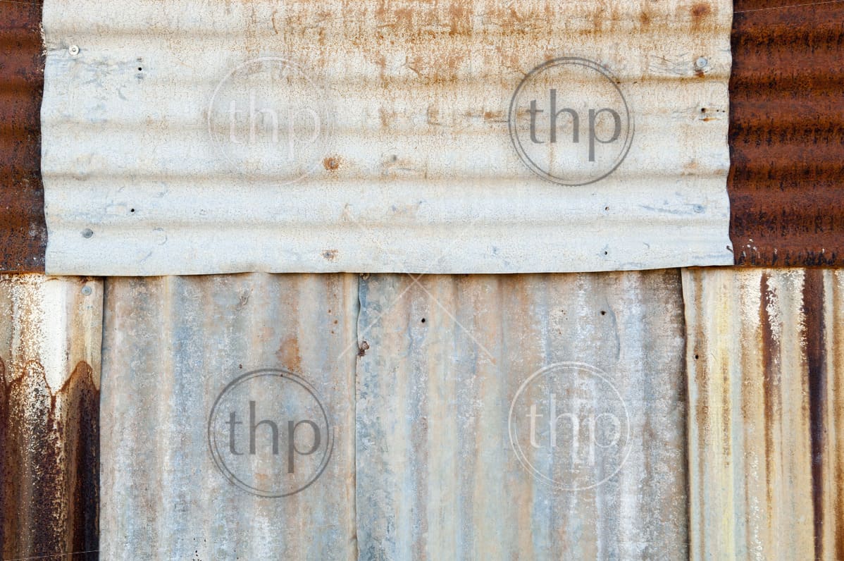 Rusted Metal Background Of Corrugated Iron And Tin With Rivets Thpstock