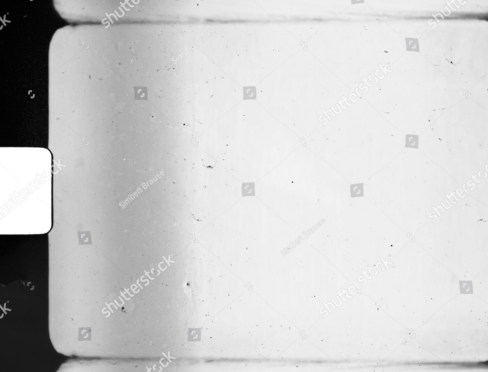 Vintage Super 8 film reel isolated on white background - THPStock